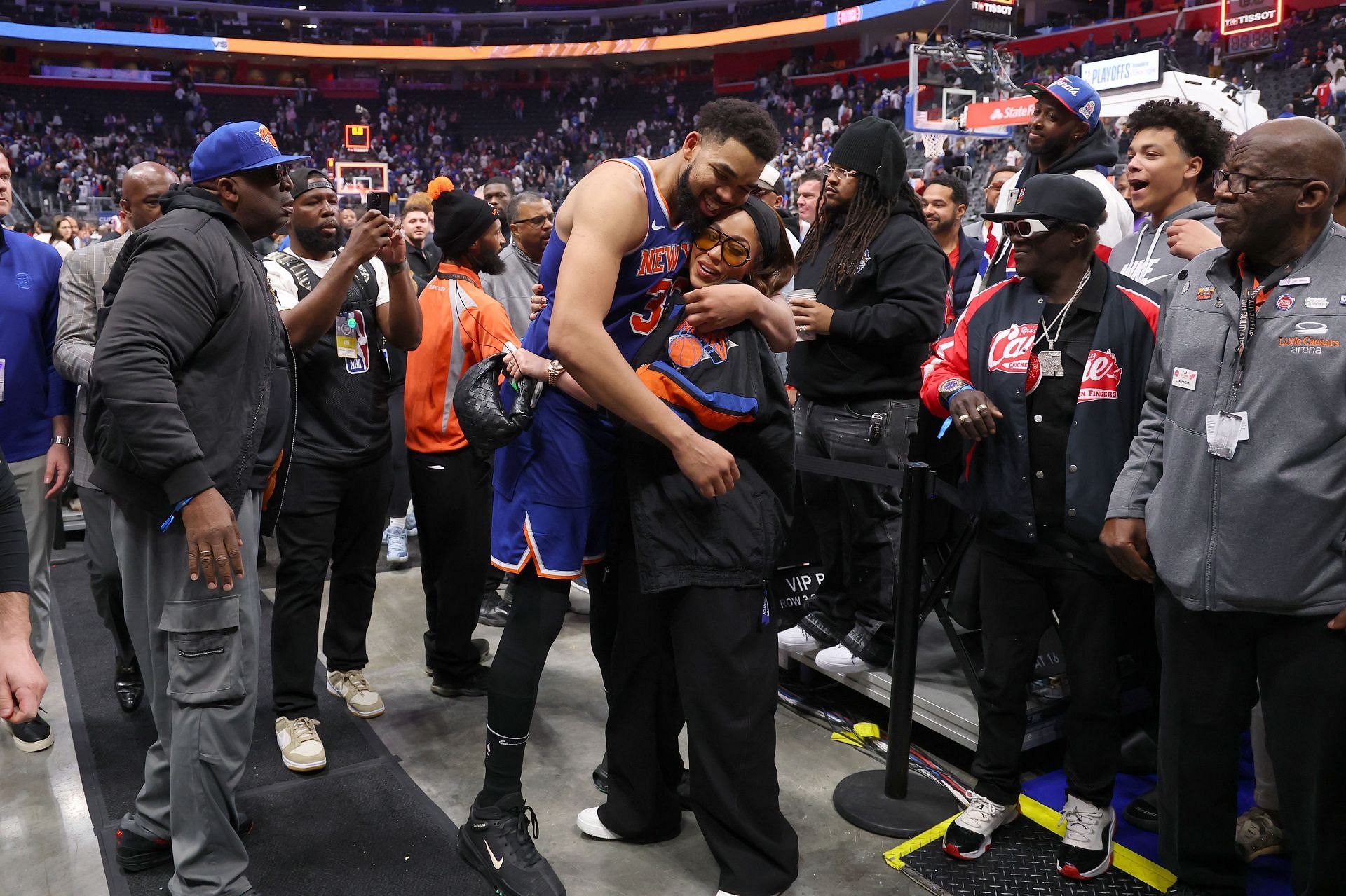 Karl-Anthony Towns #32 of the New York Knicks celebrates with Jordyn Woods after defeating the Detroit Pistons in Game Four of the Eastern Conference First Round NBA Playoffs at Little Caesars Arena on April 27, 2025 - Source: Getty